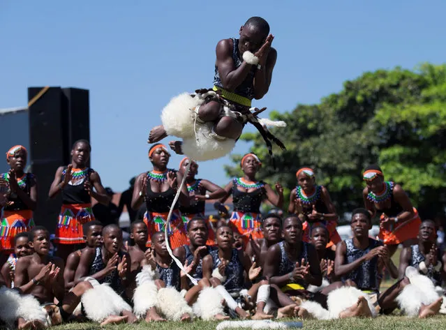 A performer jumps during the annual Sishaya Ingoma dance competition in Durban, South Africa March 24, 2018. (Photo by Rogan Ward/Reuters)