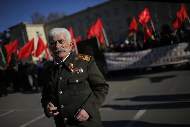 Zaur Tsurtsumia, 78, depicts Soviet dictator Josef Stalin during a rally marking Stalin's birthday anniversary at his hometown of Gori, west of capital Tbilisi, December 21, 2014. (Photo by David Mdzinarishvili/Reuters)