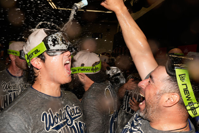 Los Angeles Dodgers pitcher Shohei Ohtani celebrate after their win against the Toronto Blue Jays in Game 7 of baseball's World Series, Sunday, November 2, 2025, in Toronto. (Photo by Brynn Anderson/AP Photo)