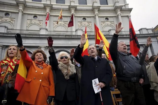 Supporters of Spain's late dictator Francisco Franco give fascist salutes during a gathering commemorating the 40th anniversary of Franco's death, at Madrid's Plaza de Oriente, Spain, November 22, 2015. (Photo by Juan Medina/Reuters)