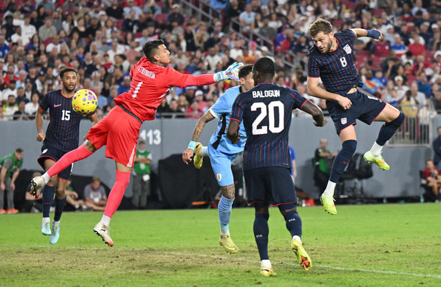 United States' Tanner Tessman (8) scores on Uruguay goalie Cristopher Fiermarin (1) during the second half of an international friendly soccer game, Tuesday, November 18, 2025, in Tampa, Fla. (Photo by Jason Behnken/AP Photo)