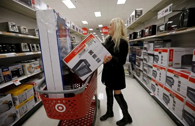 Nancy Villagomez shops for items during Black Friday Shopping at a Target store in Chicago, Illinois, United States, November 27, 2015. (Photo by Jim Young/Reuters)