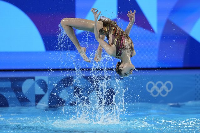 China's Wang Liuyi and Wang Qianyi, compete in the duet free routine of artistic swimming at the 2024 Summer Olympics, Saturday, August 10, 2024, in Saint-Denis, France. (Photo by Lee Jin-man/AP Photo)