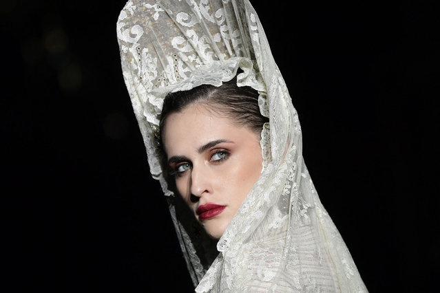 A model showcases a creation by Spanish designers Juan Foronda and Rafa Diaz during the 13th edition of the “We Love Flamenco – WLF” fashion show, in Seville on January 13, 2025. (Photo by Cristina Quicler/AFP Photo)