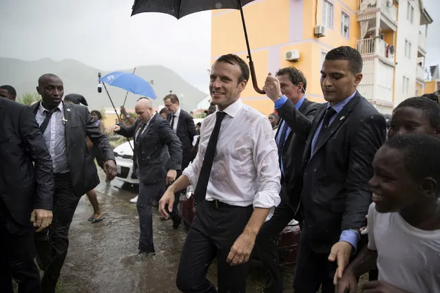 French President Emmanuel Macron visits Quartier d'Orleans, during a trip in the French West Indies, one year after Hurricanes Irma and Maria damaged the French Caribbean island of Saint-Martin September 29, 2018. (Photo by Thomas Samson/Pool via Reuters)