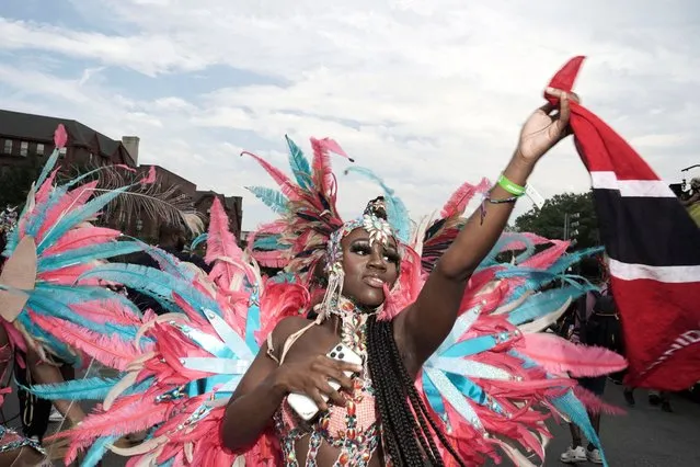 People take part in the annual West Indian American Day parade in the Brooklyn borough of New York City, New York, U.S., September 4, 2023. (Photo by Bing Guan/Reuters)