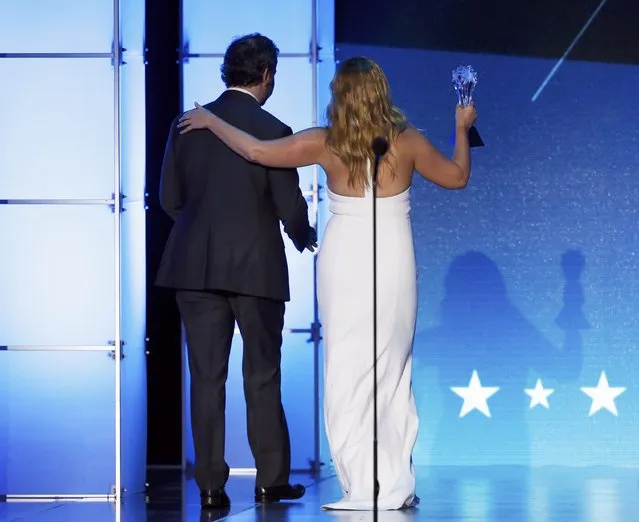 Amy Schumer embraces Judd Apatow after she accepted the Most Valuable Person in Film and TV award during the 21st Annual Critics' Choice Awards in Santa Monica, California January 17, 2016. (Photo by Mario Anzuoni/Reuters)