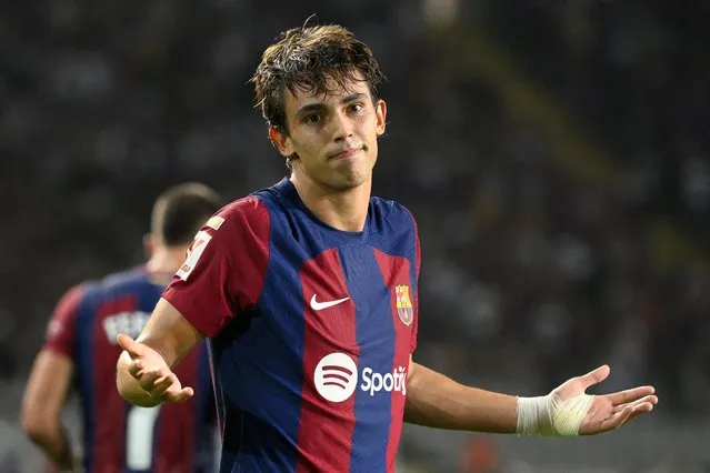 Barcelona's Portuguese forward #14 Joao Felix celebrates after scoring his team's first goal during the Spanish Liga football match between FC Barcelona and Real Betis at the Estadi Olimpic Lluis Companys in Barcelona on September 16, 2023. (Photo by Josep Lago/AFP Photo)