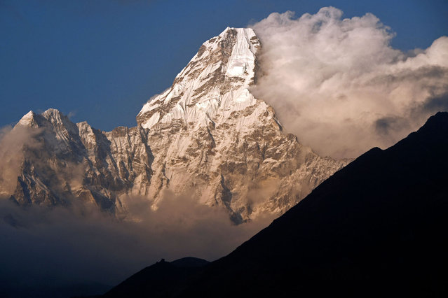 Mount Ama Dablam is pictured from the Everest region of Solukhumbu district on April 26, 2021. (Photo by Prakash Mathema/AFP Photo)