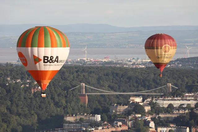 Hot air balloon teams have gathered at Ashton Court, Bristol, UK this morning, August 7, 2023, for a second launch event ahead of this year's Bristol International Balloon Fiesta, which starts on Thursday, August 10. (Photo by Tom Wren/South West News Service)