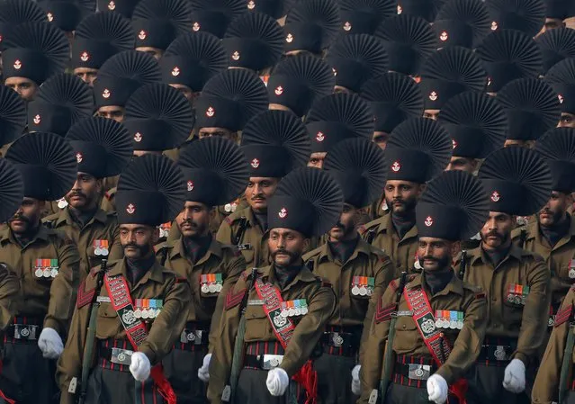Indian soldiers march during the full dress rehearsal for the Republic Day parade in New Delhi, January 23, 2019. (Photo by Altaf Hussain/Reuters)