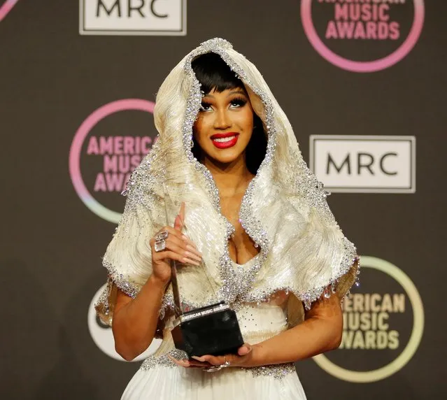 Cardi B, winner of the Favourite Hip-Hop Song award, poses in the press room during the 2021 American Music Awards at the Microsoft Theater in Los Angeles, California, U.S., November 21, 2021. (Photo by Aude Guerrucci/Reuters)