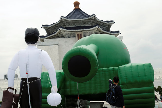 A giant balloon in the shape of a China's military tank and Tank Man are placed at the Liberty Square, ahead of June 4th anniversary of military crackdown on pro-democracy protesters in Tiananmen Square in Taipei, Taiwan, May 21, 2019. (Photo by Tyrone Siu/Reuters)