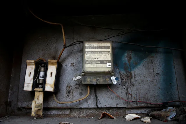 An electricity meter is seen in a house in Caracas, Venezuela, April 2, 2016. (Photo by Carlos Garcia Rawlins/Reuters)
