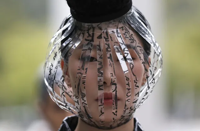 A model displays a creation featuring the Korean alphabet, Hangeul, by one of 40 designers during the Hangeul fashion show as a part of Seoul 365 Fashion Show at the National Hangeul Museum in Seoul, South Korea, Monday, September 9, 2019. (Photo by Lee Jin-man/AP Photo)