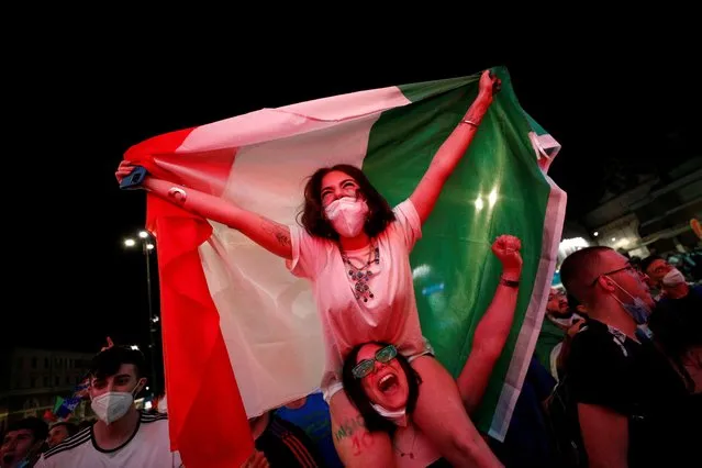  Italy fans celebrate during the UEFA EURO 2020 Group A football match between Turkey and Italy during “Casa Azzurri” at pratibus district on June 11, 2021 in Rome, Italy. (Photo by Guglielmo Mangiapane/Reuters)