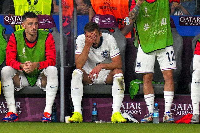 England's forward #09 Harry Kane reacts as he sits on the bench after a substitution during the UEFA Euro 2024 final football match between Spain and England at the Olympiastadion in Berlin on July 14, 2024. (Photo by Jewel Samad/AFP Photo)