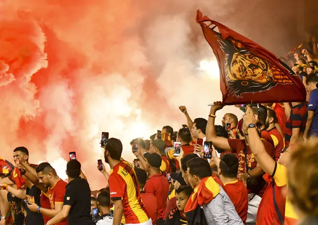 Esperance Sportive de Tunis's supporters cheer for their team during the FIFA Club World Cup Qatar 2019 second round match between Saudi Arabia's Al Hilal FC and Tunisia's Esperance Sportive de Tunis at the Jassim bin Hamad Stadium in Doha on December 14, 2019. (Photo by Chine Nouvelle/SIPA Press/Rex Features/Shutterstock)