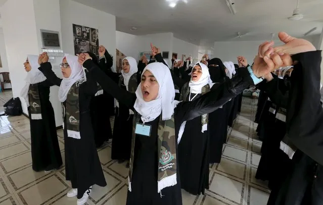 Palestinian girls exercise during a summer camp organized by Hamas movement in Rafah in the southern Gaza Strip August 10, 2015. (Photo by Ibraheem Abu Mustafa/Reuters)