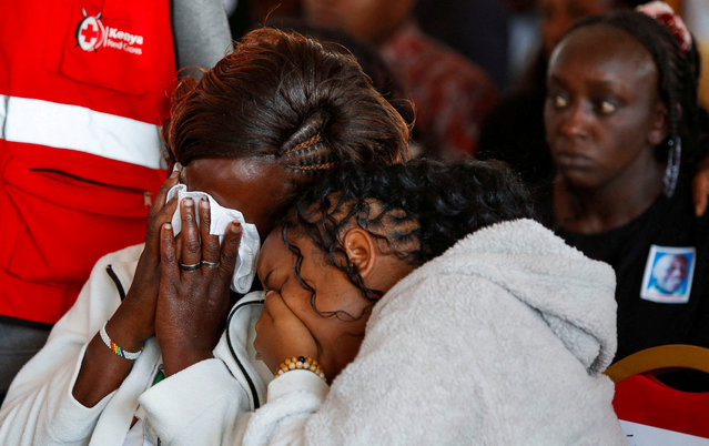 Mourners react as they attend a memorial service for the pupils who died after a fatal fire at the Hillside Endarasha Academy within Kieni in Nyeri County, Kenya on September 26, 2024. (Photo by Monicah Mwangi/Reuters)