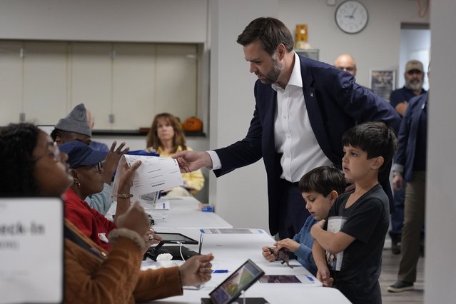 Republican vice presidential nominee Sen. JD Vance, R-Ohio, and children, arrives to vote at the St Anthony of Padua Maronite Catholic Church on election day, Tuesday, November 5, 2024, in Cincinnati. (Photo by Carolyn Kaster/AP Photo)
