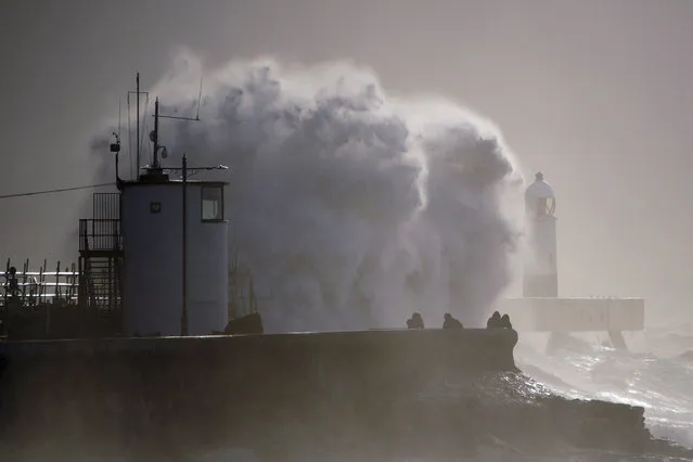 Huge waves hitting the sea wall after Storm Franklin moved in overnight, just days after Storm Eunice destroyed buildings and left over 1 million homes in Britain without power, in Porthcawl, Wales, Monday, February 21, 2022. (Photo by Ben Birchall/PA Wire via AP Photo)