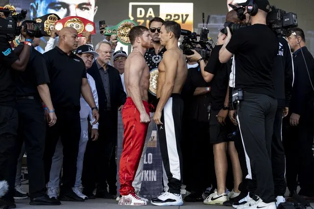 Mexican boxer Canelo Alvarez (L) and Kazakhstani boxer Gennady Golovkin face each other following their weigh-in at the Toshiba Plaza in Las Vegas, Nevada, USA, 16 September 2022. Canelo and Golovkin will fight the last of their trilogy combat on 17 September 2022, at the T-Mobile Arena in Las Vegas. (Photo by Etienne Laurent/EPA/EFE)