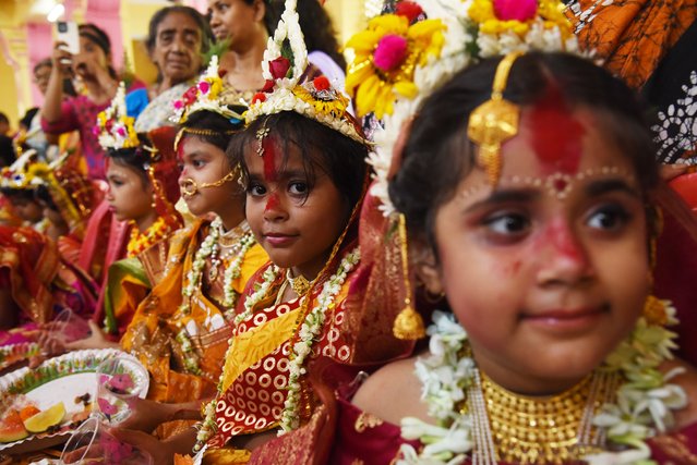 Young girls participate in the “Kumari Puja” ritual as part of the annual Hindu festival of Ram Navami at the Adyapeath ashram on the outskirts of Kolkata, India, on April 6, 2025. (Photo by Debajyoti Chakraborty/NurPhoto/Rex Features/Shutterstock)