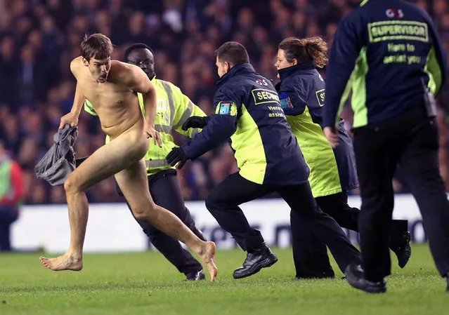 A supporter streaks on the pitch during the international rugby match between Scotland and New Zealand at Murrayfield, Edinburgh, Scotland, Saturday November 15, 2014. (Photo by Scott Heppell/AP Photo)