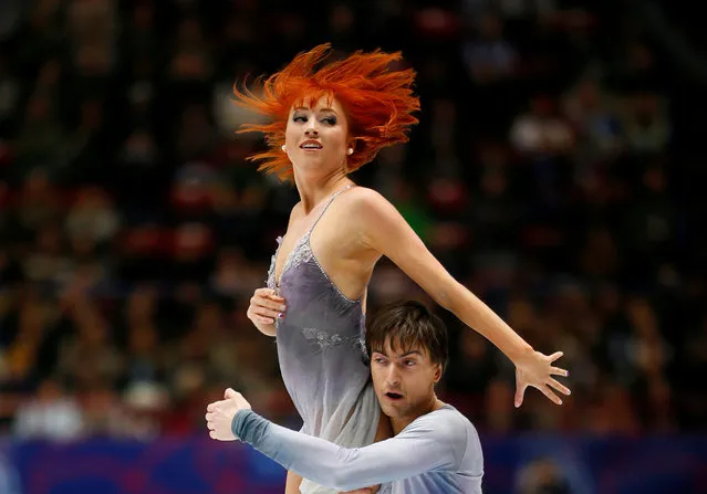 Tiffani Zagorski and Jonathan Guerreiro from Russia perform during the Ice Dance- Free Dance program at the Milan 2018 World Figure Skating Championship on March 24, 2018. (Photo by Alessandro Garofalo/Reuters)