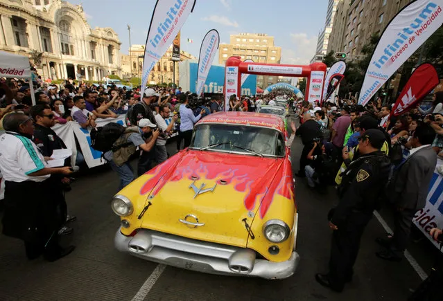 Participants drive as they arrive in Mexico City to take part in the Carrera Panamericana (“Pan-American Road Race”) in Mexico October 15, 2016. (Photo by Henry Romero/Reuters)