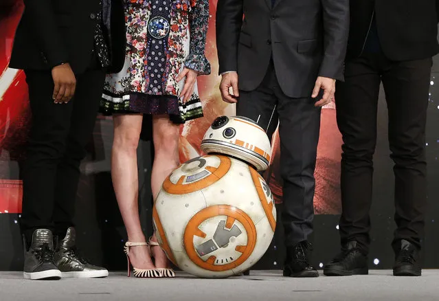 BB-8 droid poses with actors and director during a press conference for their latest film “Star Wars: The Force Awakens” at a hotel in Urayasu, near Tokyo Friday, December 11, 2015. (Photo by Shuji Kajiyama/AP Photo)