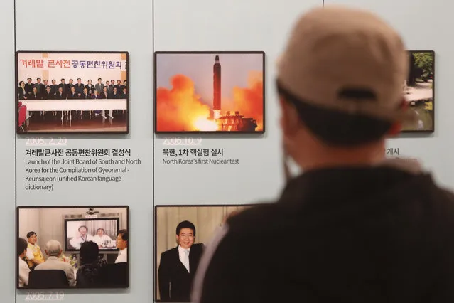 A photo showing North Korea's missile launch is displayed at the Unification Observation Post in Paju, near the border with North Korea, South Korea, Wednesday, March 24, 2021. North Korea fired short-range missiles this past weekend, just days after the sister of Kim Jong Un threatened the United States and South Korea for holding joint military exercises. (Photo by Ahn Young-joon/AP Photo)