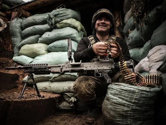 A Ukrainian serviceman of the 24-th Mechanized Brigade pictured in a trench in the Donetsk region, Ukraine, 06 November 2023. (Photo by Oleg Petrasyuk/EPA/EFE)