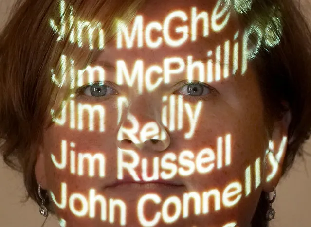 Connie McCready a member of the Scottish branch of the UK group Covid-19 Bereaved Families for Justice has the names of Covid victims including her partner Jim Russell projected onto her face at a media conference at the Mariott Hotel, Glasgow, following the announcement that the Scottish Government will begin an independent inquiry into the handling of the Covid-19 pandemic by the end of the year. Picture date: Tuesday August 24, 2021. (Photo by Andrew Milligan/PA Images via Getty Images)