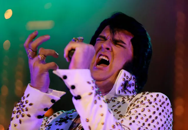 Elvis tribute artist Matt Birse from Adelaide performs in the final of the Ultimate Elvis tribute artist competition at the 25th annual Parkes Elvis Festival in the rural Australian town of Parkes, west of Sydney, January 14, 2017. (Photo by Jason Reed/Reuters)