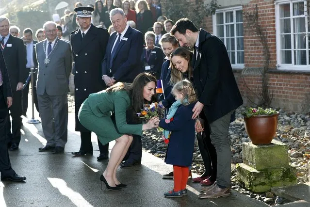 Britain's Catherine, Duchess of Cambridge, receives a bouquet of flowers as she arrives for her visit to East Anglia's Children's Hospices (EACH) in Quidenham, Britain, January 24, 2017. (Photo by Darren Staples/Reuters)