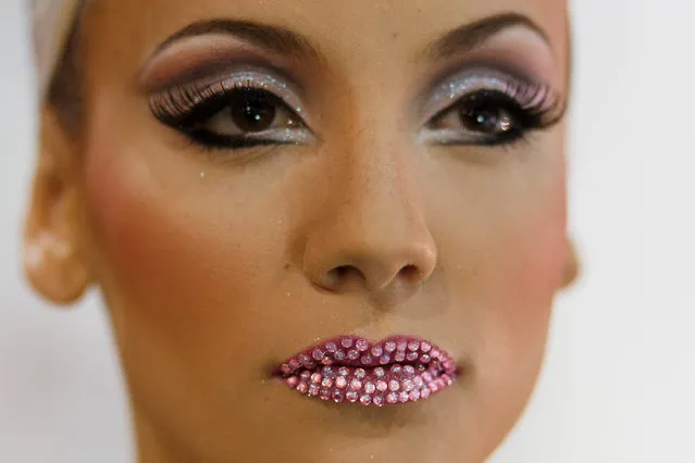 Nominee Carmen Desire Garcia looks on at backstage on Queen of the 2013 Santa Cruz carnival Gala on February 26, 2014 in Santa Cruz de Tenerife on the Canary island of Tenerife, Spain. (Photo by Pablo Blazquez Dominguez/Getty Images)