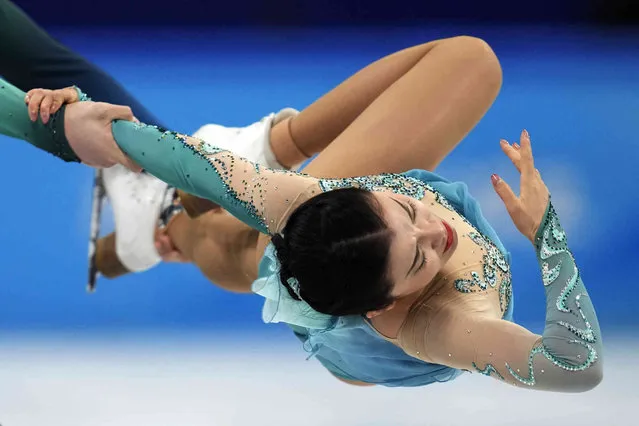 Wang Shiyue and Liu Xinyu, of China, compete in the team ice dance program during the figure skating competition at the 2022 Winter Olympics, Monday, February 7, 2022, in Beijing. (Photo by Natacha Pisarenko/AP Photo)
