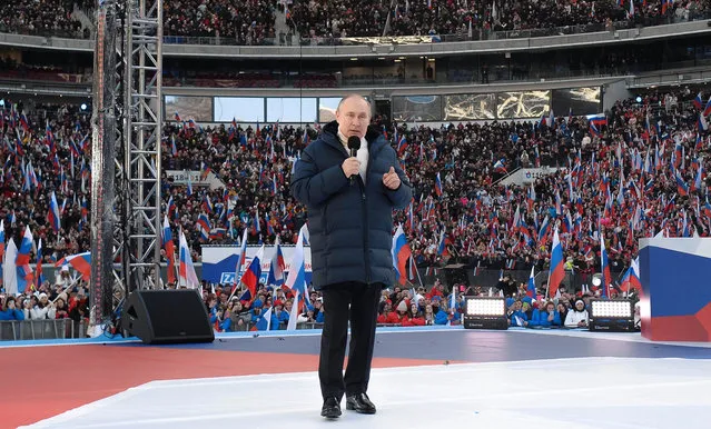 Russian President Vladimir Putin delivers his speech at the concert marking the eighth anniversary of the referendum on the state status of Crimea and Sevastopol and its reunification with Russia, in Moscow, Russia, Friday, March 18, 2022. (Photo by Ramil Sitdikov/Sputnik Pool Photo via AP Photo)