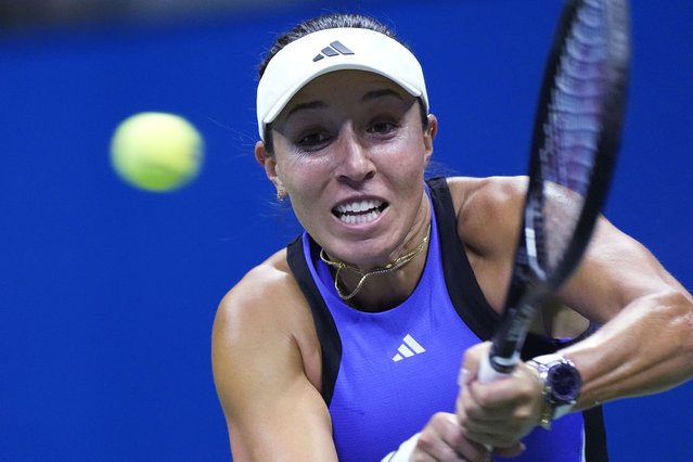 Jessica Pegula, of the United States, returns to Iga Świątek, of Poland, during the quarterfinals of the U.S. Open tennis championships, Wednesday, September 4, 2024, in New York. (Photo by Eduardo Munoz Alvarez/AP Photo)