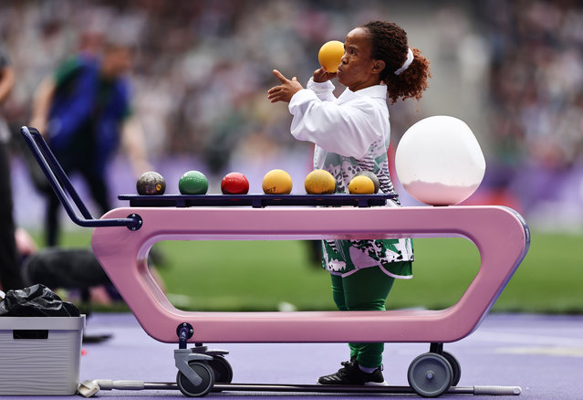 Nigeria shot putter Lauritta Onye selects her shot during the F40 final at Stade de France in Paris, France on September 7, 2024. (Photo by Tom Maher/INPHO/Rex Features/Shutterstock)