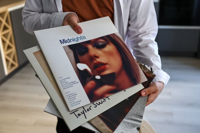 A fan shows Taylor Swift vinyl albums during a meeting with other Swifties in Lyubertsy outside Moscow, Russia on September 15, 2024. (Photo by Evgenia Novozhenina/Reuters)