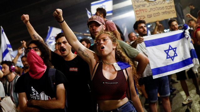 Protesters block Ayalon Highway during a demonstration following a parliament vote on a contested bill that limits Supreme Court powers to void some government decisions, in Tel Aviv, Israel on July 25, 2023. (Photo by Corinna Kern/Reuters)