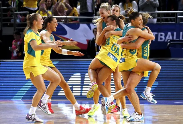 Members of the Australian team celebrate after winning their Netball World Cup final game against New Zealand in Sydney, Australia, August 16, 2015. (Photo by David Gray/Reuters)