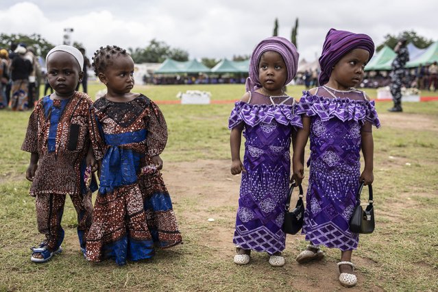 Twins pose for a photograph during the Igboora World Twins Festival 2024, in Igbo-Ora on October 12, 2024. (Photo by Olympia de Maismont/AFPPhoto)