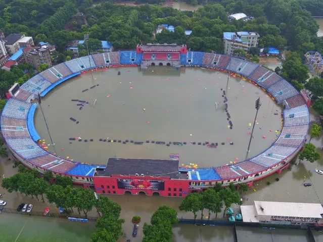 A view of a flooded sports stadium is seen in Wuhan, Hubei province, July 6, 2016. (Photo by Reuters/China Daily)