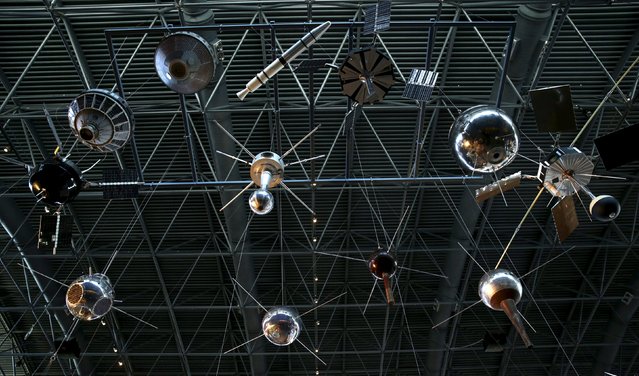 Satellites and space probes hang on display at the Udvar-Hazy Smithsonian National Air and Space Annex Museum in Chantilly, Virginia August 28, 2015. (Photo by Gary Cameron/Reuters)