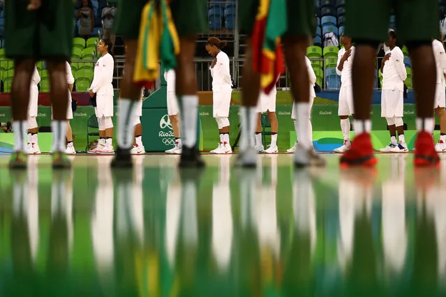 The United States and Senegal line up prior to a Women's Preliminary Round basketball game between the United States and Senegal at Carioca Arena 1 on August 7, 2016 in Rio de Janeiro, Brazil. (Photo by Sean M. Haffey/Getty Images)