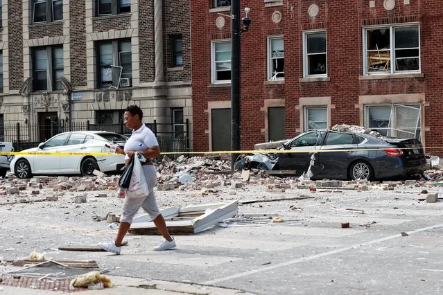 Bricks and debris are scattered on the street after a building explosion caused injuries in Chicago, Illinois, U.S. September 20, 2022. (Photo by Kamil Krzaczynski/Reuters)